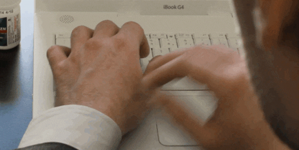 Man looking at his watch GIF
